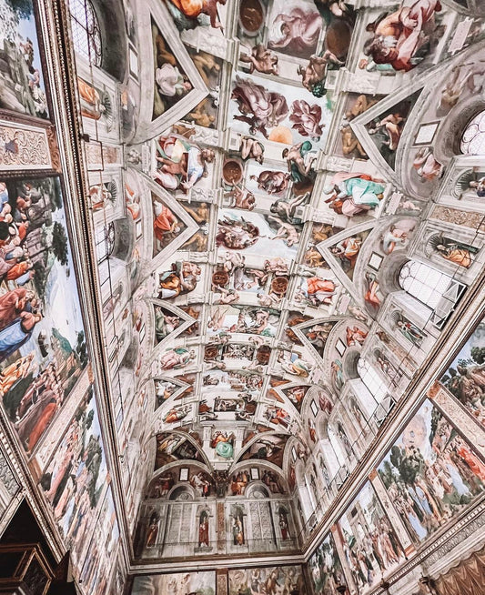 How did Michelangelo paint the Sistine Chapel?